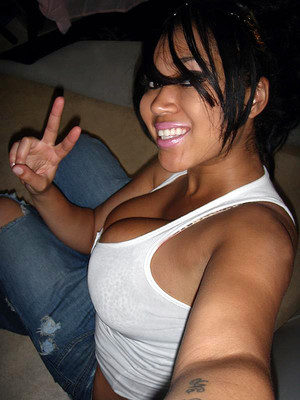Horny black teen poses naked and shows..