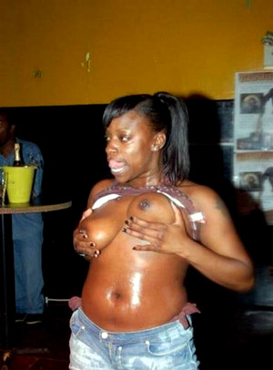 Naked ebony girlfriend squeezing her